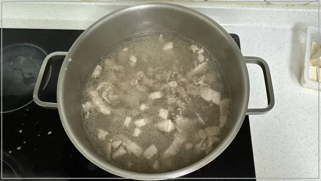 boiling-pork-for-kimchi-jjigae
