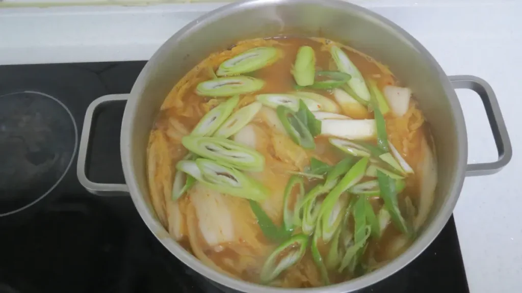 spicy-cabbage-doenjang-soup-green-onion-finish